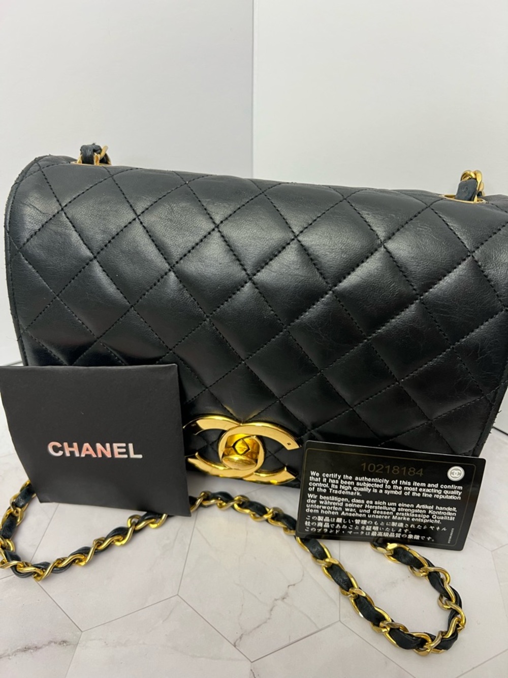CHANEL Black Quilted Lambskin Shoulder Bag with Gold Hardware